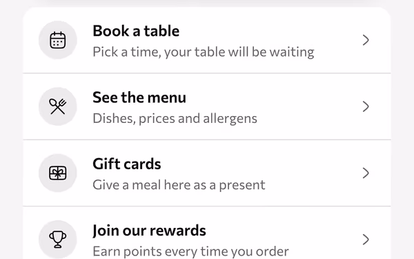 The venue's page on a phone: book a table, see the menu, gift cards and rewards