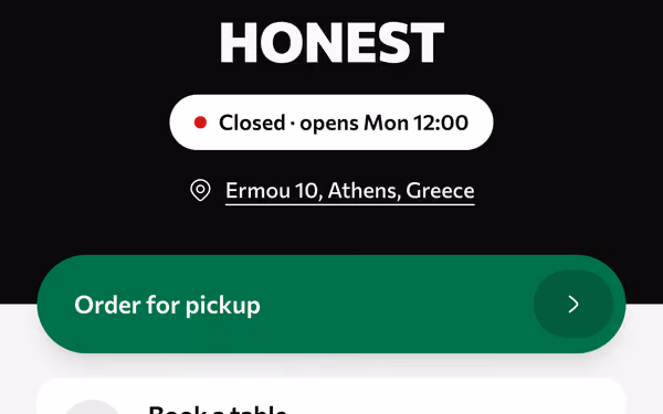 The venue's own page on a phone, with Order for pickup and Book a table